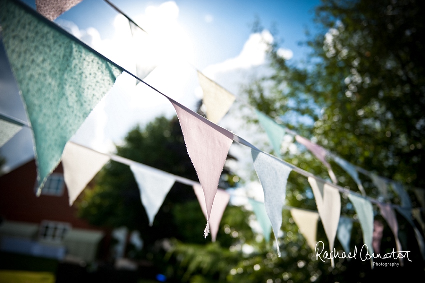 Professional photograph of wedding bunting outside wedding marquee