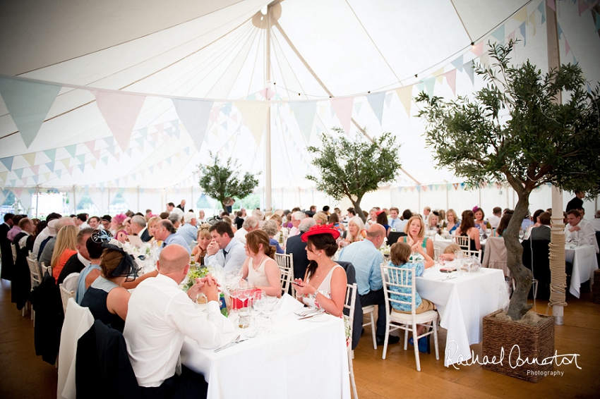 Professional photograph of wedding bunting outside wedding marquee