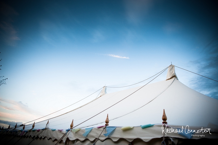 Professional photograph of wedding bunting outside wedding marquee