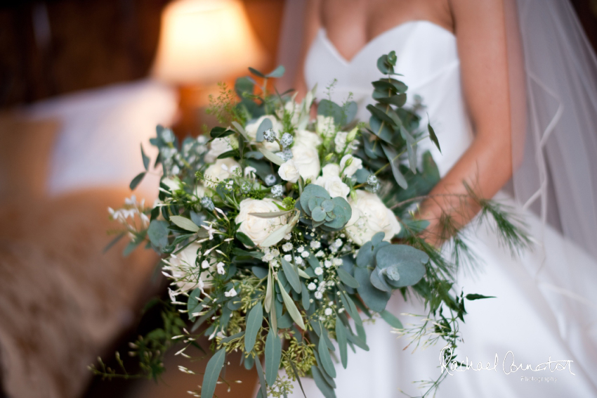 Professional colour photograph of Eloise and Will's winter wedding at Rushton Hall by Rachael Connerton Photography