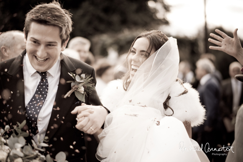Professional colour photograph of Eloise and Will's winter wedding at Rushton Hall by Rachael Connerton Photography