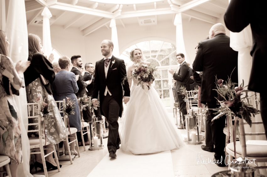 Professional colour photograph of Sarah and Johnathan's Christmas wedding at Stapleford Park by Rachael Connerton Photography