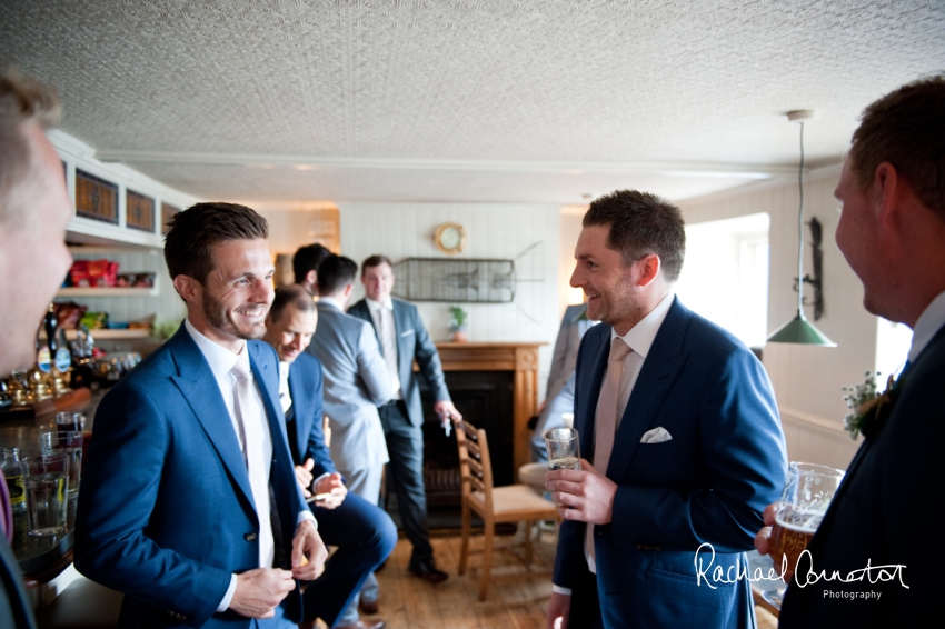 Professional colour photograph of Holly and Chris' Cornwall beach wedding at Palhawn Fort by Rachael Connerton Photography