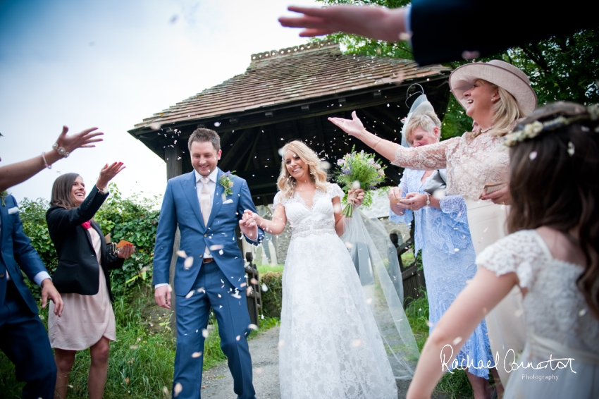 Professional colour photograph of Holly and Chris' Cornwall beach wedding at Palhawn Fort by Rachael Connerton Photography