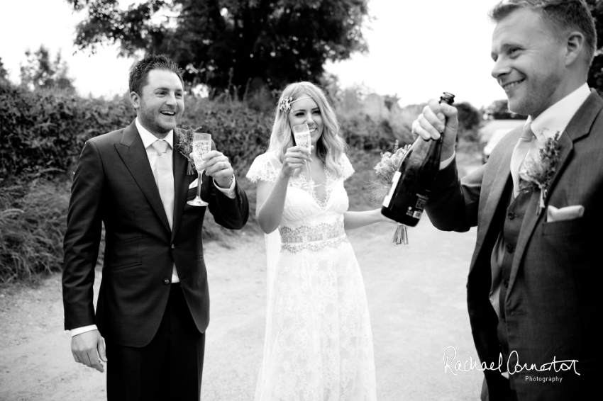 Professional colour photograph of Holly and Chris' Cornwall beach wedding at Palhawn Fort by Rachael Connerton Photography