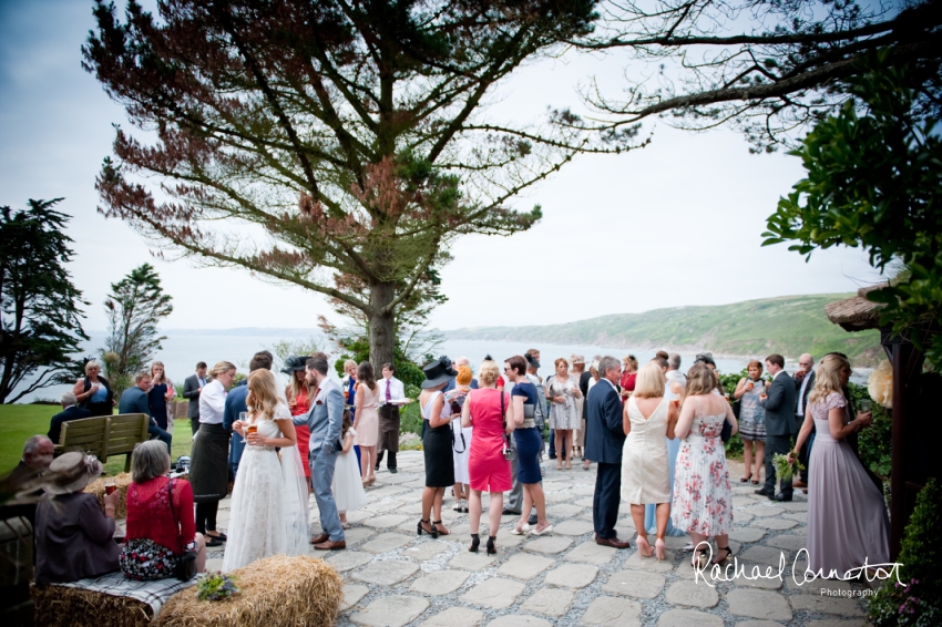 Professional colour photograph of Holly and Chris' Cornwall beach wedding at Palhawn Fort by Rachael Connerton Photography